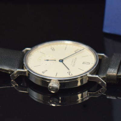 26777748b - NOMOS Glashütte Tangente to 125 pieces limited gents wristwatch in steel, Germany sold according to papers in May 2003, manual winding, snap on case back and bezel, silvered dial with Arabic numerals and line-indices, blued steel hands, calibre ETA 7001, 17 jewels, blued screws, diameter approx. 35 mm, original box and papers, signs of use otherwise condition 2