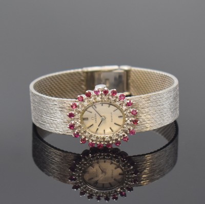 Image 26777848 - OMEGA 14k white gold ladies wristwatch with diamonds and rubies, Switzerland around 1970, manual winding, case with gold bracelet, snap on case back, bezel with rubies and diamonds, silvered dial with applied hour-indices, black hands, copper coloured movement calibre 485, 17 jewels, diameter approx. 21 mm, length approx. 15,5 cm, total-weight approx. 34g, overhaul recommended at buyer's expense, condition 2