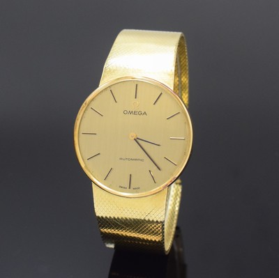 Image 26778108 - OMEGA 14k yellow gold gents wristwatch, Switzerland around 1973, self winding, milanaise bracelet, snap on case back, champagne coloured dial with raised hour- indices, black hands, copper coloured movement calibre 711, 24 jewels, 2 adjustments, diameter approx. 32,5 mm, length approx. 17,5 cm, total-weight approx. 66g, winding crown missing, overhaul recommended at buyer's expense, condition 2-3