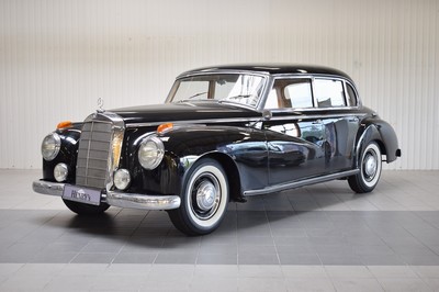 26778255b - Mercedes-Benz 300 Adenauer, first registered 08/1952, mileage read 23,000 km, 3 owners, historic registration, MOT 10/2025, 85 kW/115 PS, 6-cylinder, manual transmission, black exterior, Beige/Grey leather interior, original set of luggage available. The vehicle was first registered in Kaiserslautern (copy of registration document available). There are various invoices for the vehicle from 2012 to 01/2023 totaling costs of 71,438.00.-. A folder with invoices and an expert report is available