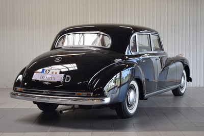 26778255e - Mercedes-Benz 300 Adenauer, first registered 08/1952, mileage read 23,000 km, 3 owners, historic registration, MOT 10/2025, 85 kW/115 PS, 6-cylinder, manual transmission, black exterior, Beige/Grey leather interior, original set of luggage available. The vehicle was first registered in Kaiserslautern (copy of registration document available). There are various invoices for the vehicle from 2012 to 01/2023 totaling costs of 71,438.00.-. A folder with invoices and an expert report is available