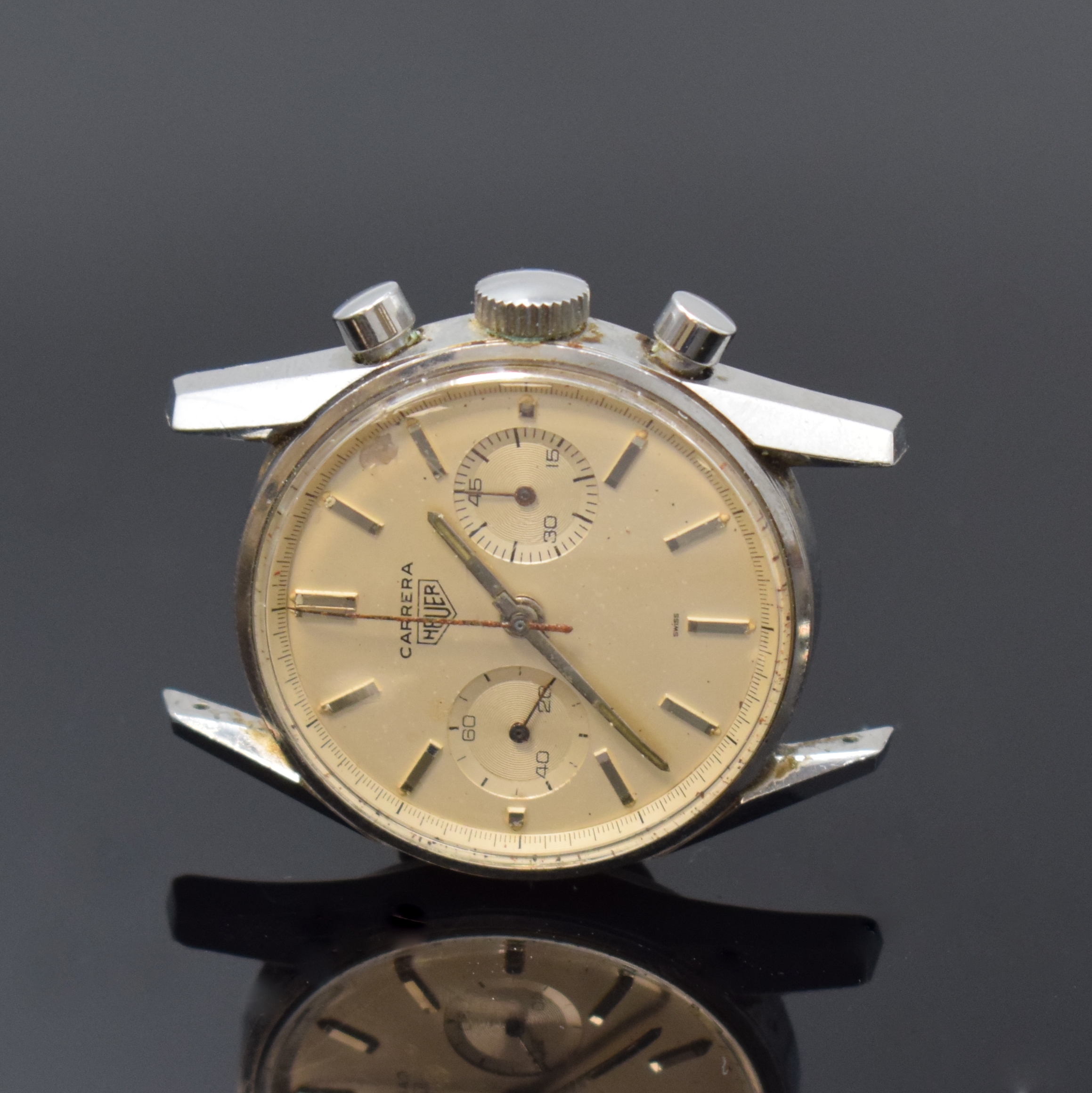 HEUER LEONIDAS S.A. Carrera Schaltradchronograph, Schweiz um 1965, Handaufzug, Edelstahlgeh., Boden geschr., orig. Krone, silb. Zifferbl. m. aufges. ...