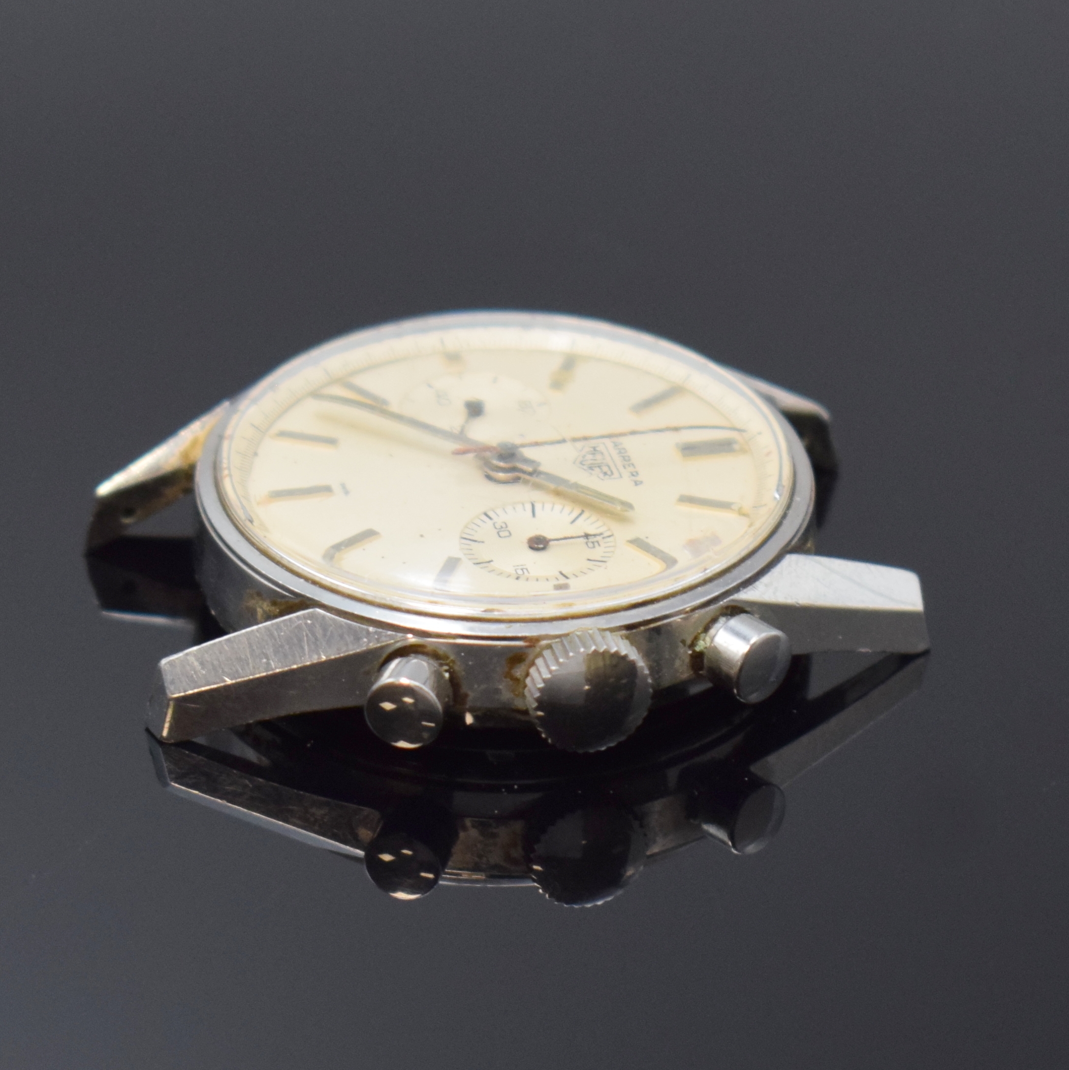 Detail a: HEUER LEONIDAS S.A. Carrera Schaltradchronograph, Schweiz um 1965, Handaufzug, Edelstahlgeh., Boden geschr., orig. Krone, silb. Zifferbl. m. aufges. ...