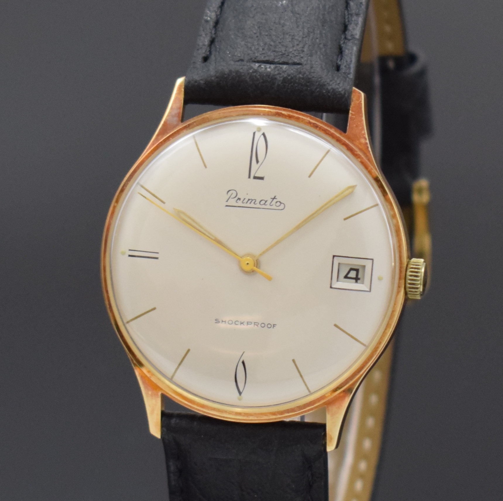 Detail a: PRIMATO nahezu neuwertige Armbanduhr, 1960er Jahre, verg. Geh., Edelstahlboden aufgedr., Anz. v. Std., Min., Zentralsek. und Datum, 17 St., Kal. 189, ...