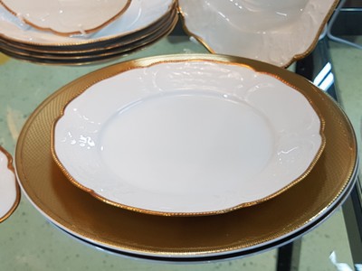 26778747a - Five underplates Christofle and dinner service, Rosenthal, Sanssouci, 20th century, porcelain, underplate micro gold plated, diamond decoration D. approx. 32 cm, service: twelve plates, lidded bowl, gravy boat, two vegetable bowls, large and small plate, gold edges
