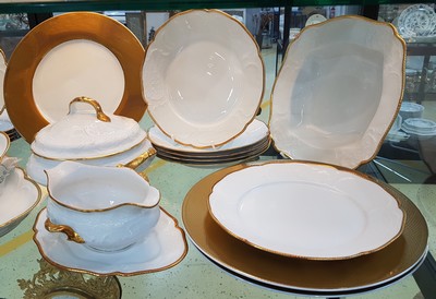 26778747b - Five underplates Christofle and dinner service, Rosenthal, Sanssouci, 20th century, porcelain, underplate micro gold plated, diamond decoration D. approx. 32 cm, service: twelve plates, lidded bowl, gravy boat, two vegetable bowls, large and small plate, gold edges