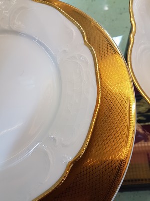 26778747h - Five underplates Christofle and dinner service, Rosenthal, Sanssouci, 20th century, porcelain, underplate micro gold plated, diamond decoration D. approx. 32 cm, service: twelve plates, lidded bowl, gravy boat, two vegetable bowls, large and small plate, gold edges