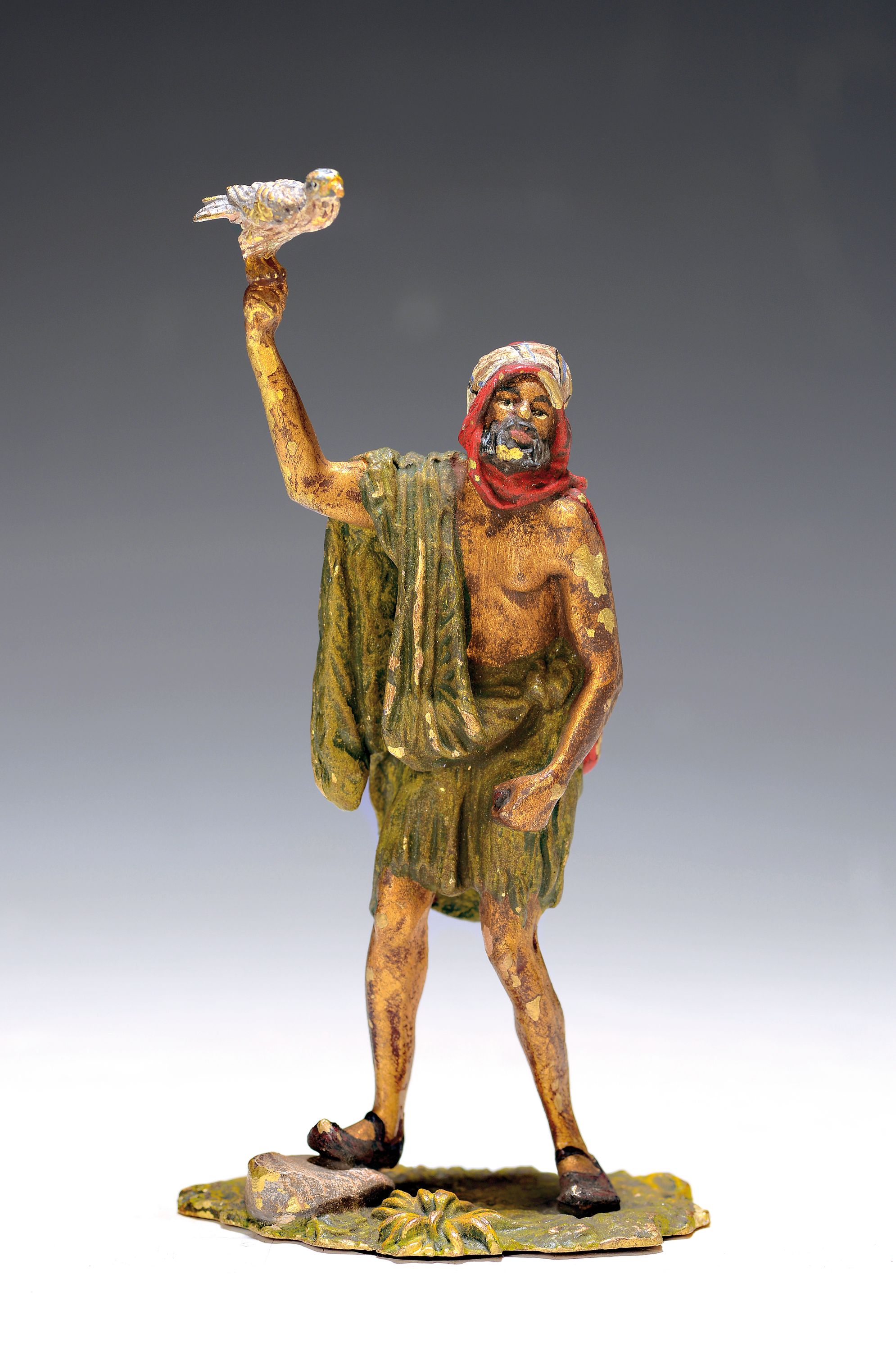 Wiener Bronze, Orientale mit Falke, sign. Fritz Bermann, bunt staffiert, H.ca. 13 cm