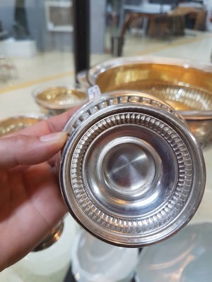 26779501d - Dessert service, Italy, 2nd half of the 20th century, 800 silver, gilded inside, large footed bowl and 11 matching small bowls, orig. Glass inserts with star cut, approx. 1910 g, diameter 22/10 cm