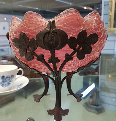 26779572a - Offering bowl, Austria, around 1900, pink glass body with applied net, metal fittings in a stylized chestnut shape, height approx. 20cm, diameter approx. 22cm