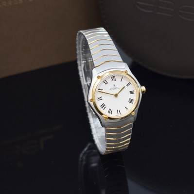 26779626b - EBEL nearly mint ladies wristwatch series Sport Classique reference 1216387A, quartz, stainless steel/gold combined including bracelet with butterfly buckle, case back screwed-down 4-times, white dial with Roman hours, display of hours & minutes, diameter approx. 29 mm, length approx. 18,5 cm, original box & papers, condition 1
