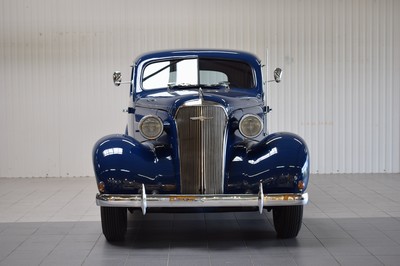 26779699a - Chevrolet Master Deluxe, first registered 01/1937, chassis number: 21GB0212426, mileage approximately 80.500 km read, MOT until 10/2023, 63 kW/85 PS, manual transmission, exterior color blue, interior fabric-red. The vehicle has undergone a complete rebuild, including sandblasting the frame, reupholstering seats, and entirely rebuilding the interior