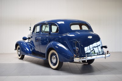 26779699c - Chevrolet Master Deluxe, first registered 01/1937, chassis number: 21GB0212426, mileage approximately 80.500 km read, MOT until 10/2023, 63 kW/85 PS, manual transmission, exterior color blue, interior fabric-red. The vehicle has undergone a complete rebuild, including sandblasting the frame, reupholstering seats, and entirely rebuilding the interior