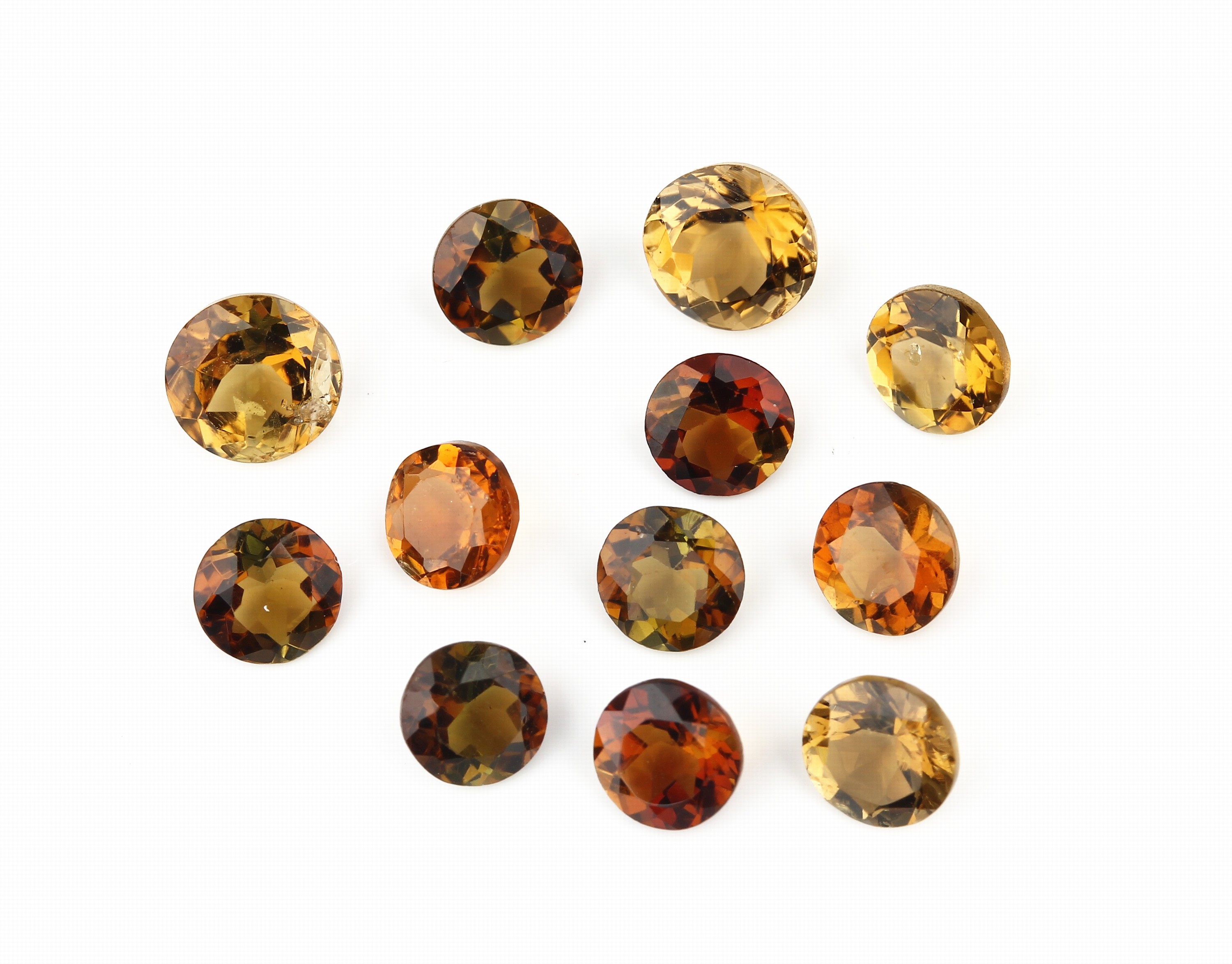 Konvolut 6 Turmalin-Pärchen zus. ca. 6.50 ct, rundfacett., braun, grün-braun, orange- braun