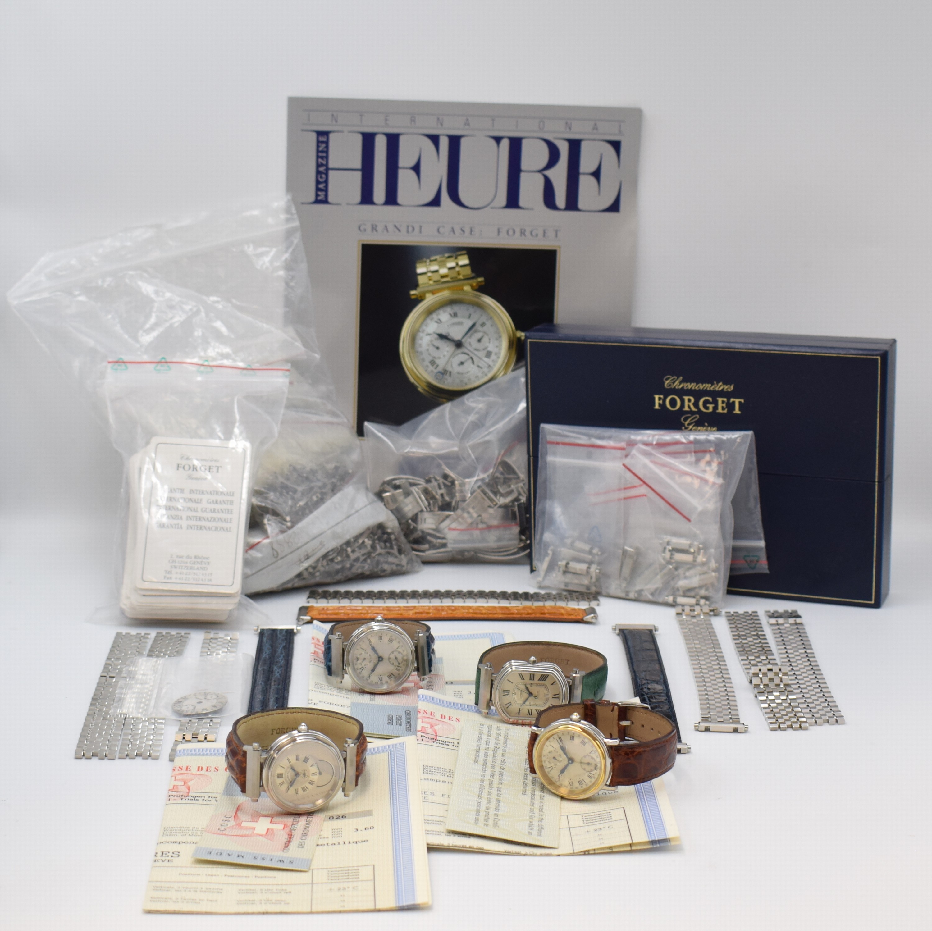 Konvolut Forget 4 Armbanduhren und großes Lot an Forget Ersatzteilen, Schweiz 1990er Jahre, Uhren alle Automatik und beids. vergl. an orig. ...