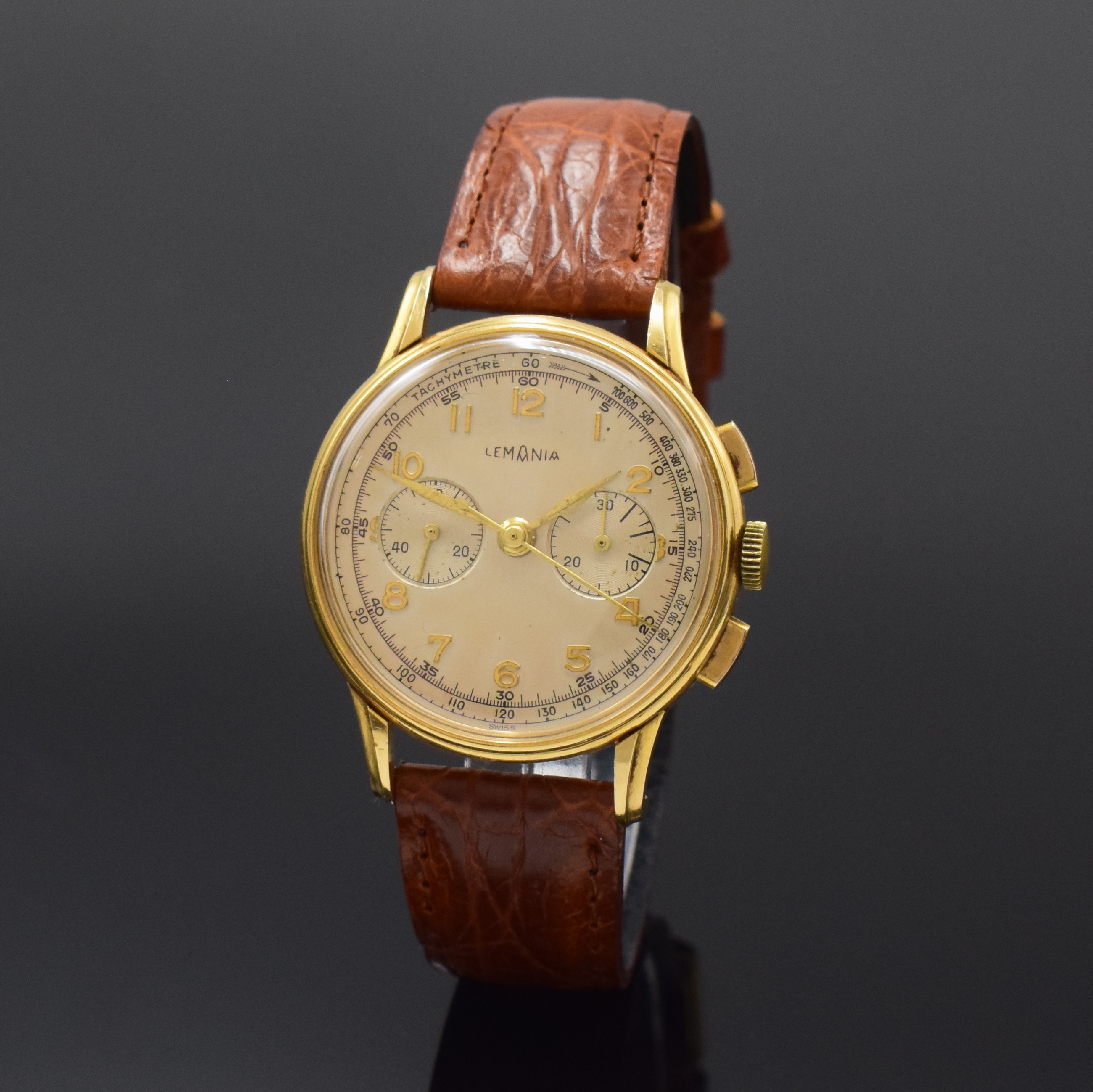 LEMANIA CH 27 Schaltradchronograph in GG 750/000, Schweiz um 1950, Handaufzug, 3-tlg. Geh. dell., Boden u. Glasrand gedr., schön pat. orig. ...