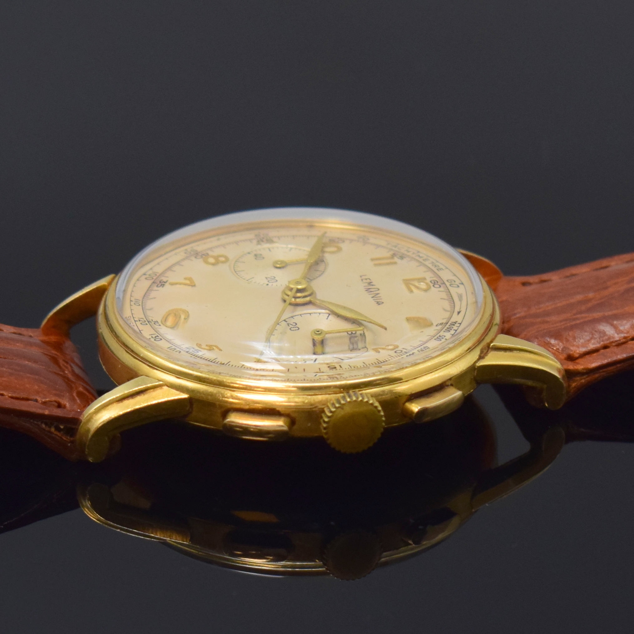 Detail b: LEMANIA CH 27 Schaltradchronograph in GG 750/000, Schweiz um 1950, Handaufzug, 3-tlg. Geh. dell., Boden u. Glasrand gedr., schön pat. orig. ...