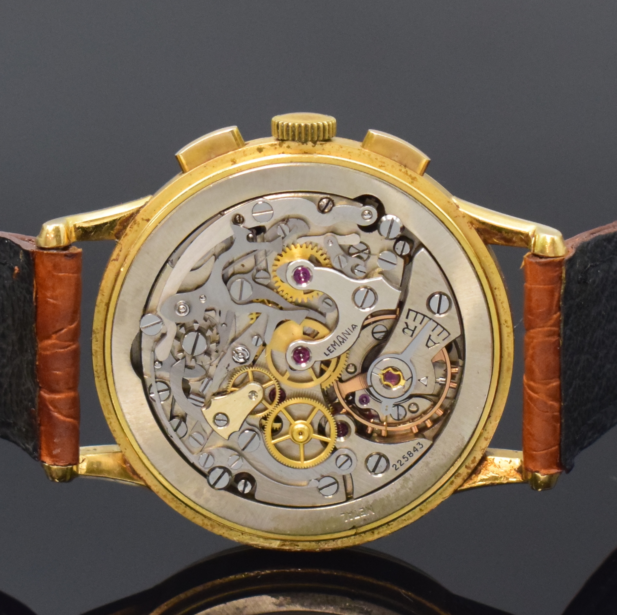 Detail e: LEMANIA CH 27 Schaltradchronograph in GG 750/000, Schweiz um 1950, Handaufzug, 3-tlg. Geh. dell., Boden u. Glasrand gedr., schön pat. orig. ...