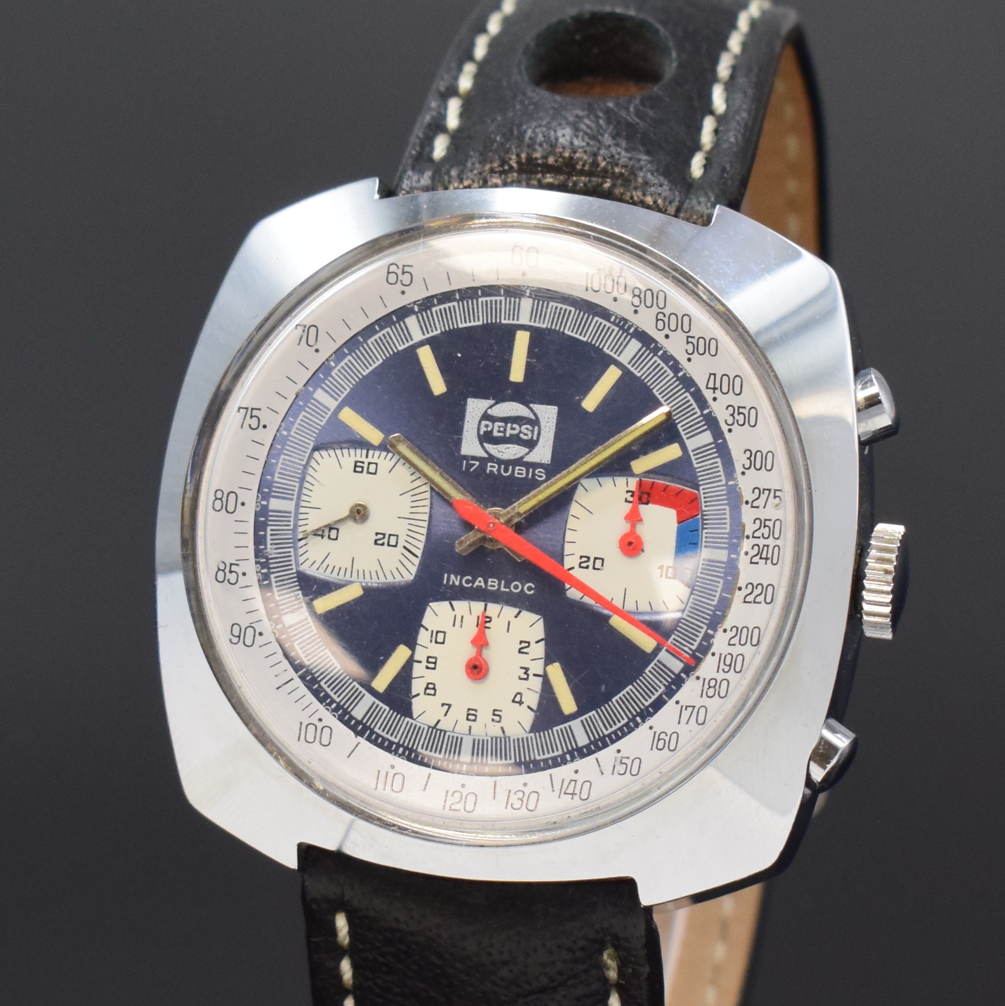 Detail a: PEPSI Armbandchronograph Valjoux 7736, Schweiz um 1970, Handaufzug, verchr. Geh. m. verschr. Stahlboden, blaues Zifferbl. m. weißen Hilfsblättern, ...