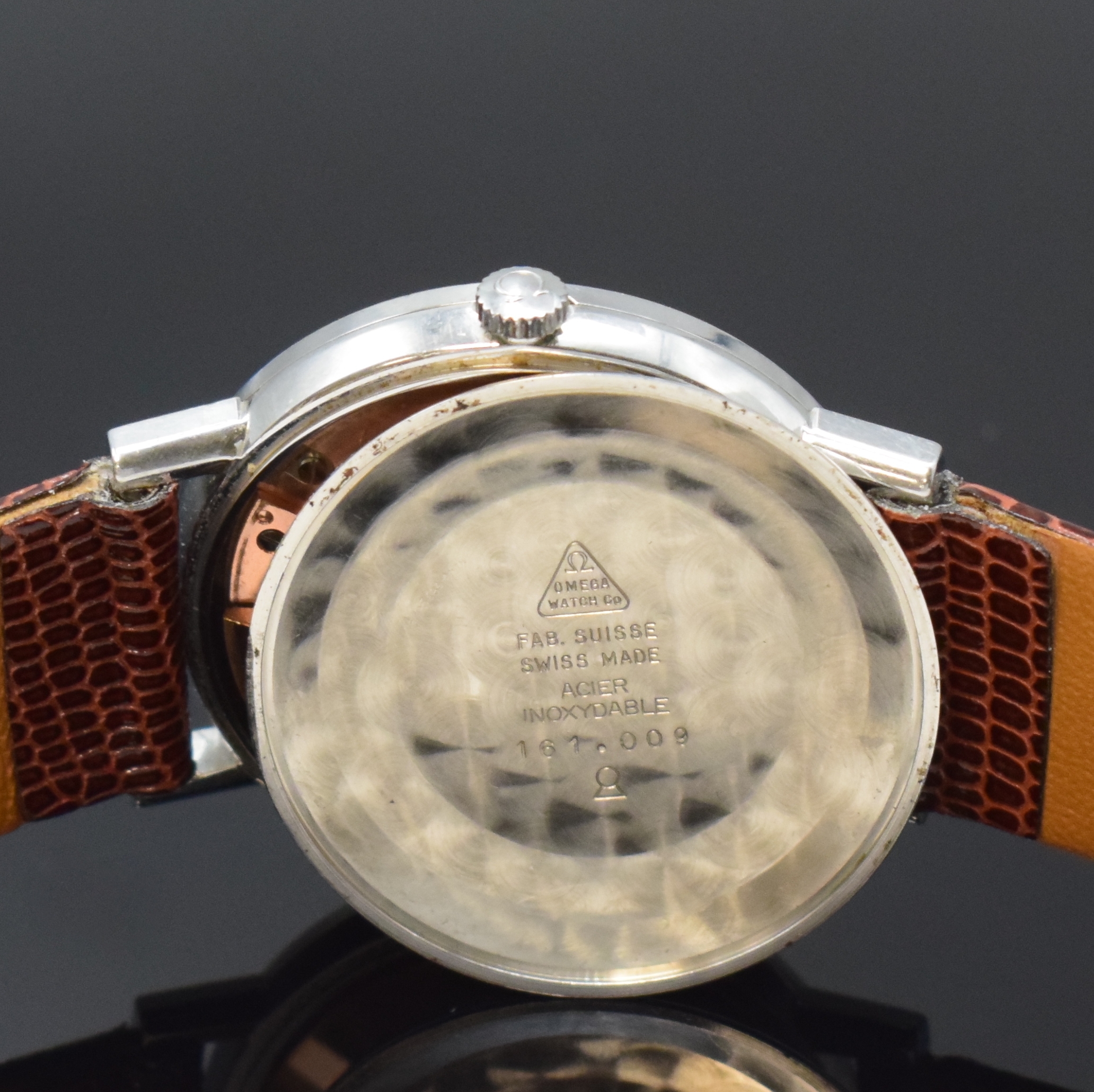 Detail f: OMEGA Referenz 161.009 Herrenarmbanduhr in Stahl, Schweiz um 1966, Automatik, 3-tlg. Geh., Boden u. Glasrand aufgedr., orig. Glas u. Krone, silb. ...