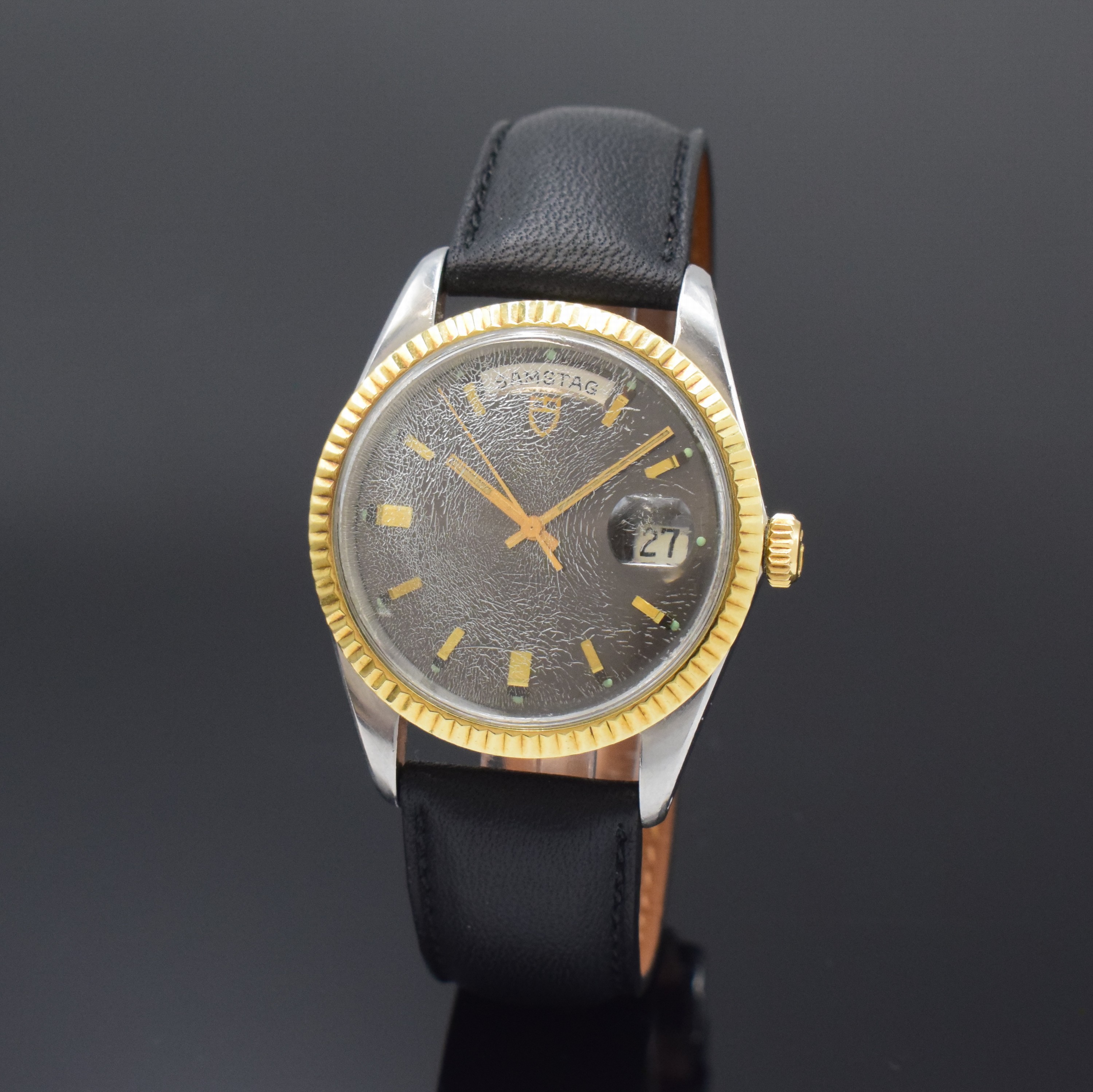 TUDOR Oyster Date-Day Referenz 7019/3 Herrenarmbanduhr in Stahl/Gold, Schweiz um 1970, Automatik, unpoliertes Oystergeh. m. Riffel-Lünette, Boden u. ...