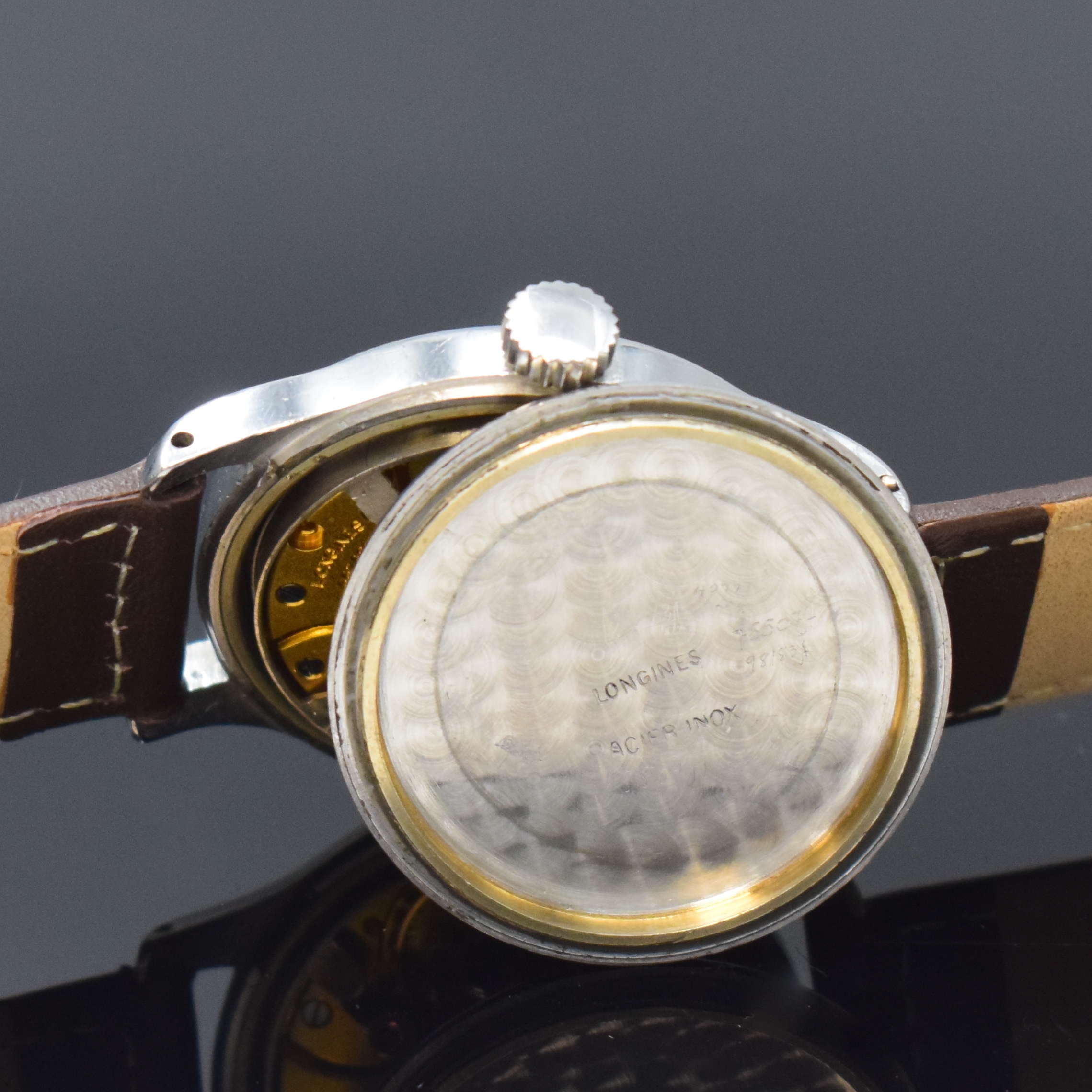 Detail e: LONGINES verschraubte Armbanduhr Referenz 22662 in Stahl, Schweiz um 1944, Handaufzug, 2-tlg. Geh., silb. Zifferbl. pat., silb. arab. Zahlen, silb. ...
