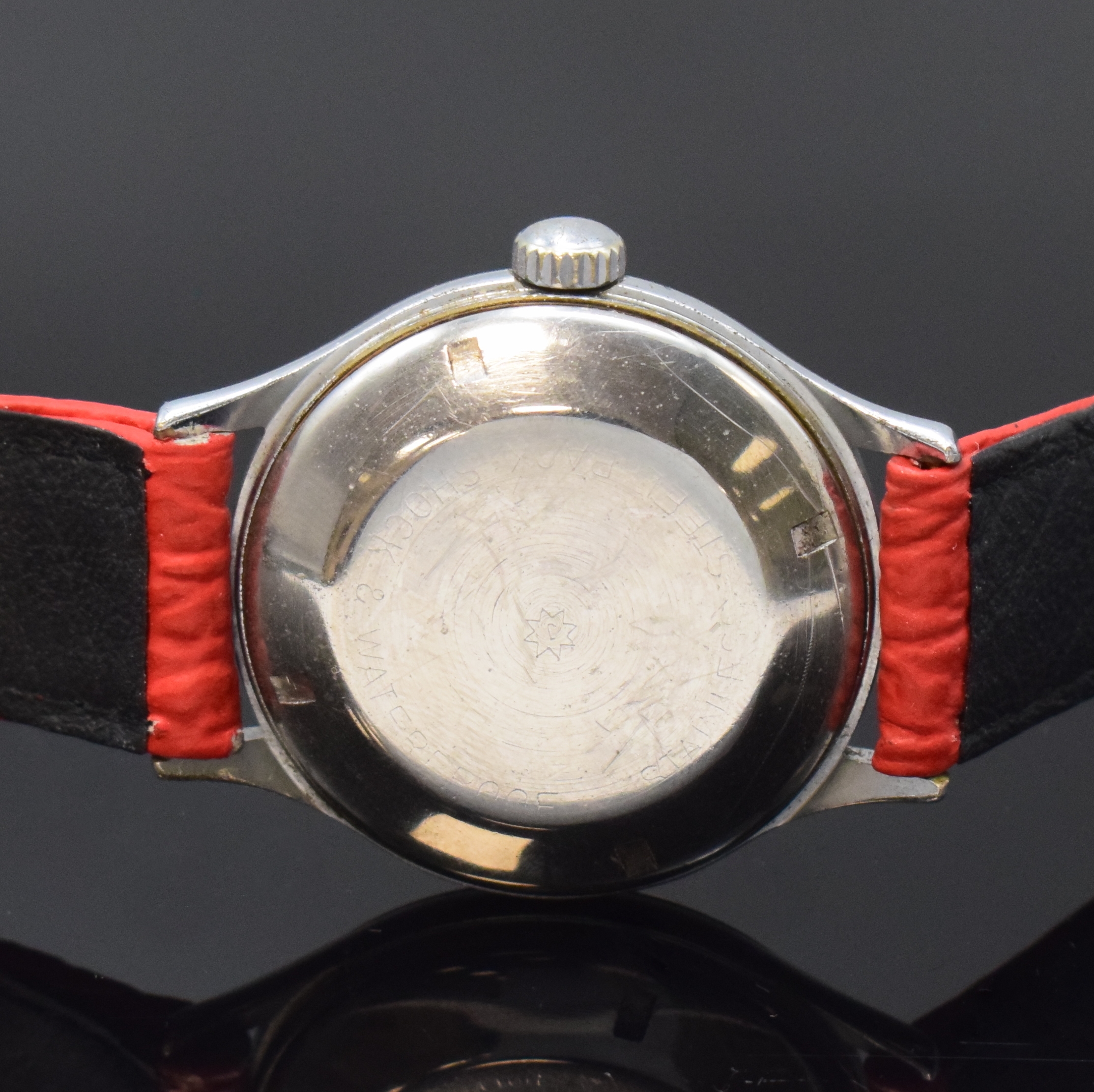 Detail c: JUNGHANS Automatik Armbanduhr mit Gangreserveanzeige Kaliber 80/12, Deutschland um 1952, 2-tlg. verchr. Geh. m. verschr. Stahlboden, schwarzes ...