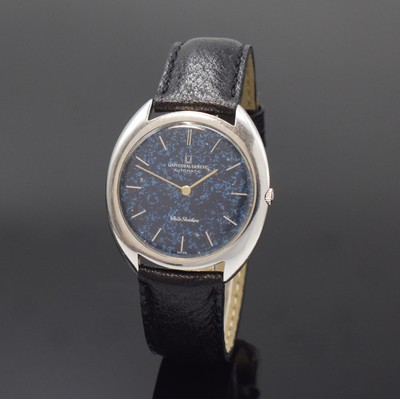 Image 26779949 - UNIVERSAL White Shadow thin self winding- wristwatch reference 866101/05 in steel, Switzerland around 1968, two piece construction case, snap on case back, original winding crown, blue marbled dial with hairline cracks (so called "Spiderweb"), applied silvered indices, silvered hands, micro-rotor-movement calibre 1-66 with fausses cotes decoration, 25 jewels, diameter approx. 35 mm, overhaul recommended at buyer's expense, condition 2, property of a collector