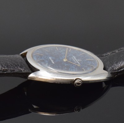 26779949b - UNIVERSAL White Shadow thin self winding- wristwatch reference 866101/05 in steel, Switzerland around 1968, two piece construction case, snap on case back, original winding crown, blue marbled dial with hairline cracks (so called "Spiderweb"), applied silvered indices, silvered hands, micro-rotor-movement calibre 1-66 with fausses cotes decoration, 25 jewels, diameter approx. 35 mm, overhaul recommended at buyer's expense, condition 2, property of a collector