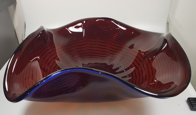 26779967a - Large bowl, Alberto Dona Murano, wine-red glass with a blue combed spiral, curved several times, signed on the base, H. approx. 17cm, D. approx. 50cm