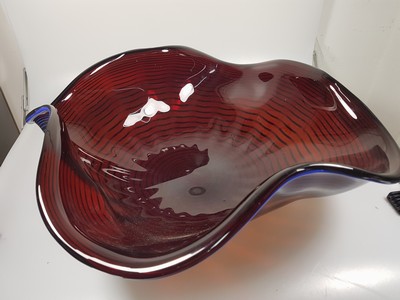 26779967b - Large bowl, Alberto Dona Murano, wine-red glass with a blue combed spiral, curved several times, signed on the base, H. approx. 17cm, D. approx. 50cm