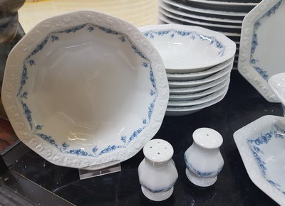 26779970h - Dinner service, Rosenthal classic rose, model Maria with blue flower tendrils, 13 flat plates 27.5cm; 13 deep plates 24cm; 8 cake plates; 9 compote bowls; 7 side bowls D. 4 of approx. 21 cm, 2 of approx. 23.5 cm, approx. 27cm; 2 oval plates, 39x23.5 cm, 33.5x20 cm.; Bread basket/handle bowl 37x18.5 cm, king cake plate, 2 different gravy boats, salt and pepper shakers