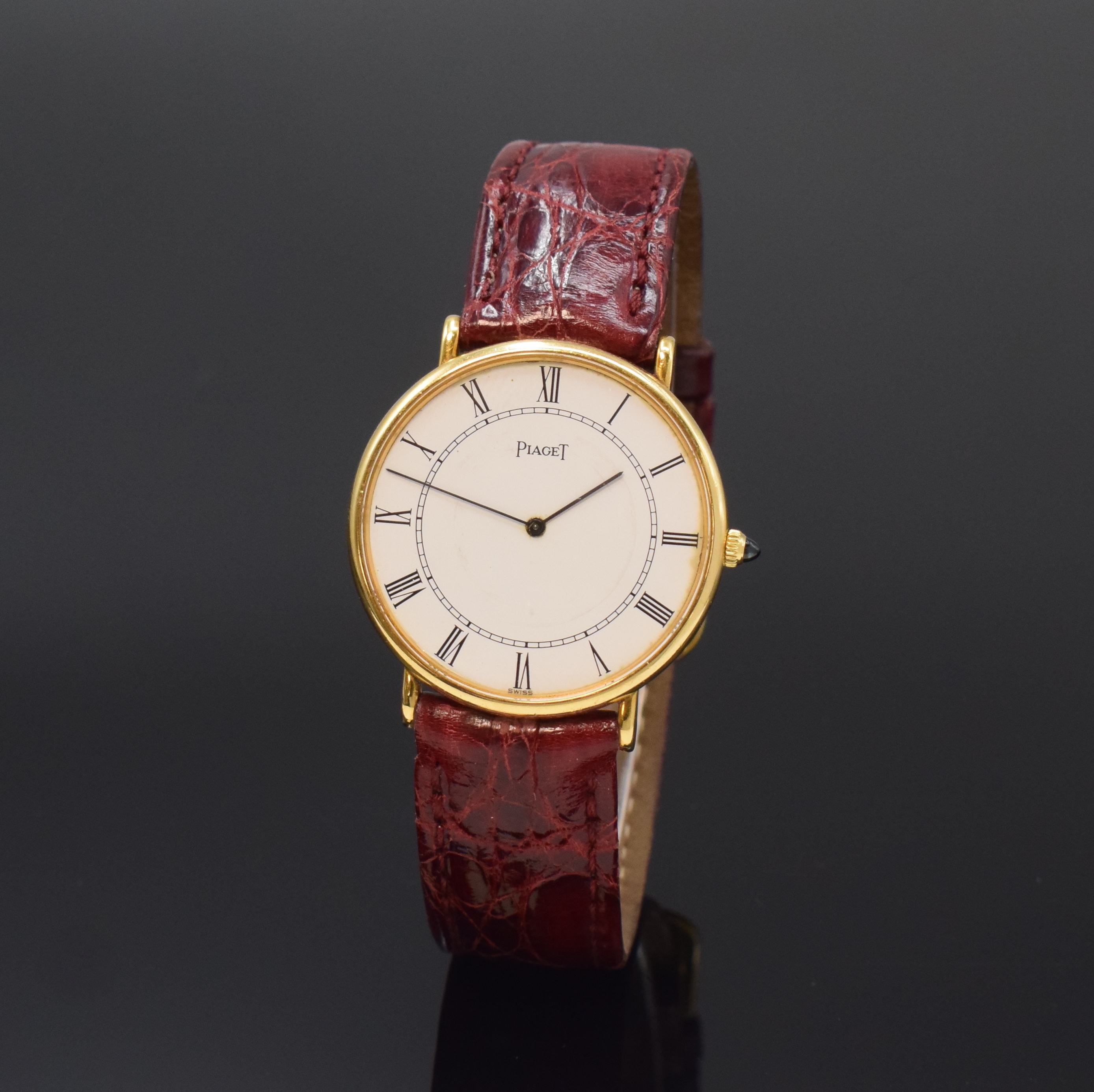 PIAGET Referenz 9035 flache und elegante Armbanduhr in GG 750/000, Schweiz um 1970, Handaufzug, 2-tlg. Geh., Boden aufgedr., weißes Zifferbl. pat., ...