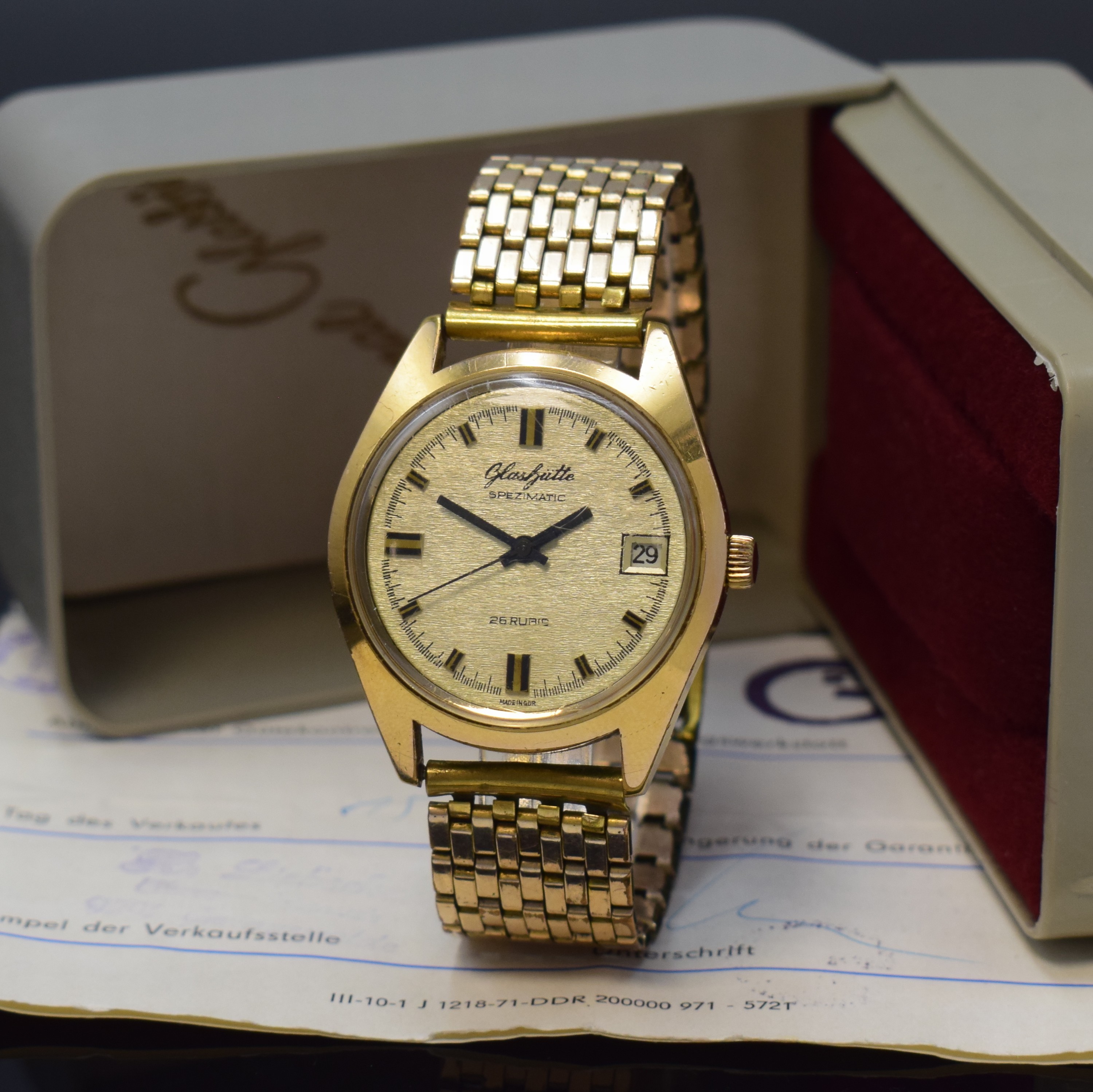 GLASHÜTTE Spezimatic vergoldete Armbanduhr mit original Box und Papier, DDR um 1975, Automatik, 2-tlg. Geh., aufgedr. Stahlboden, silb. ...