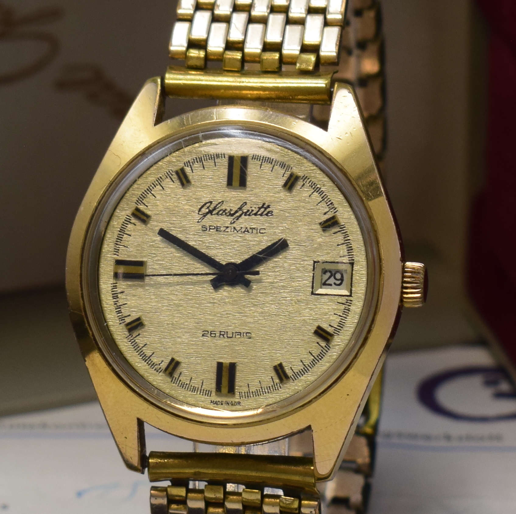 Detail a: GLASHÜTTE Spezimatic vergoldete Armbanduhr mit original Box und Papier, DDR um 1975, Automatik, 2-tlg. Geh., aufgedr. Stahlboden, silb. ...