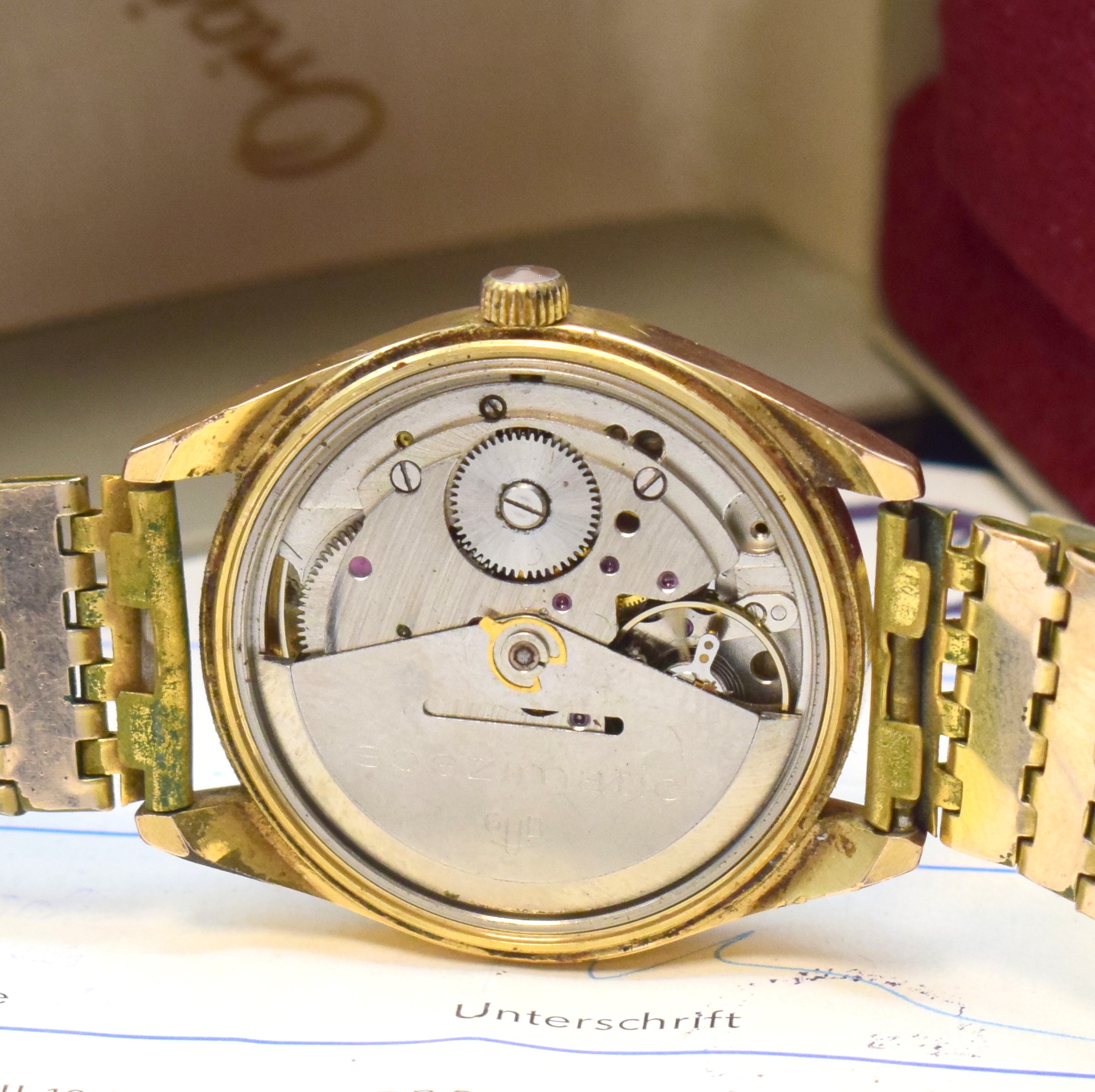 Detail e: GLASHÜTTE Spezimatic vergoldete Armbanduhr mit original Box und Papier, DDR um 1975, Automatik, 2-tlg. Geh., aufgedr. Stahlboden, silb. ...