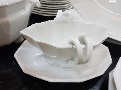26780069g - Dinner service, Nymphenburg, 20th century, 12 -sided basic shape with raised pearl rim, 12 flat plates, 11 deep plates, lidded tureen, 3 side dishes, 2 oval plates, 2 oval bowls, large round plate, gravy boat, slight traces of usage