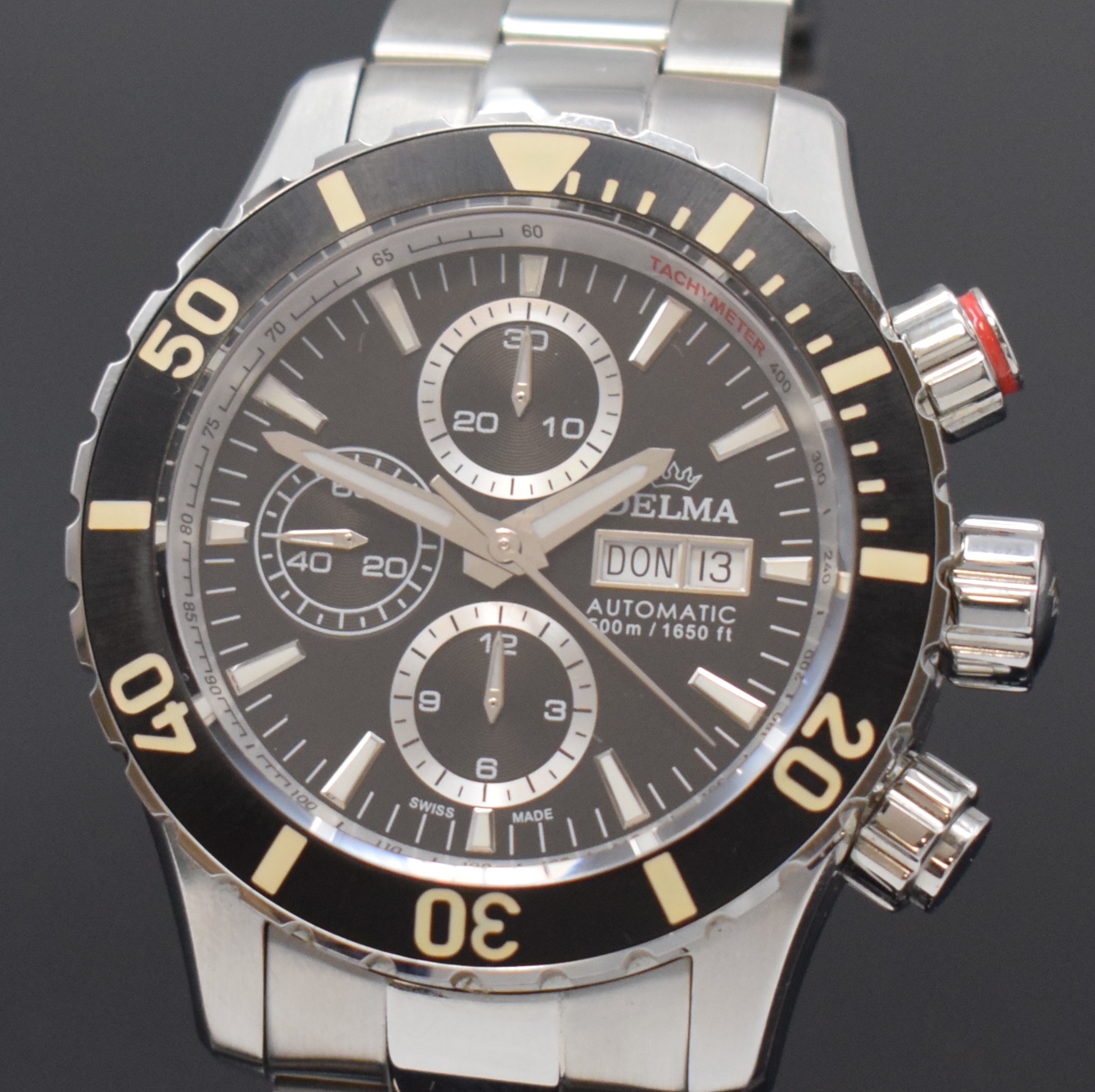 Detail a: DELMA Herrenchronograph in Stahl, Schweiz um 2015, Automatik, beids. vergl. Geh. inkl. orig. Gliederband m. Faltschl., Boden u. Krone verschr., ...