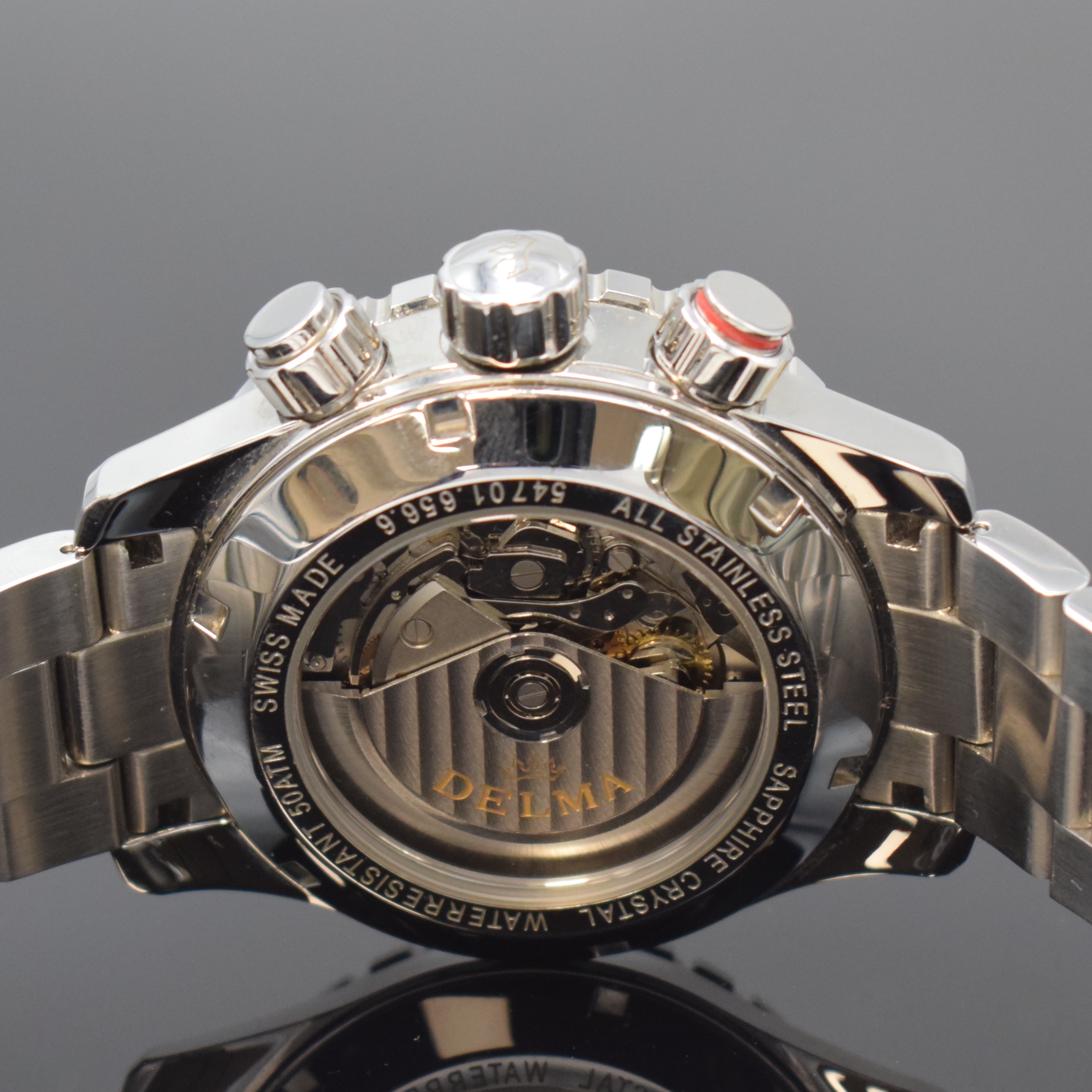 Detail d: DELMA Herrenchronograph in Stahl, Schweiz um 2015, Automatik, beids. vergl. Geh. inkl. orig. Gliederband m. Faltschl., Boden u. Krone verschr., ...