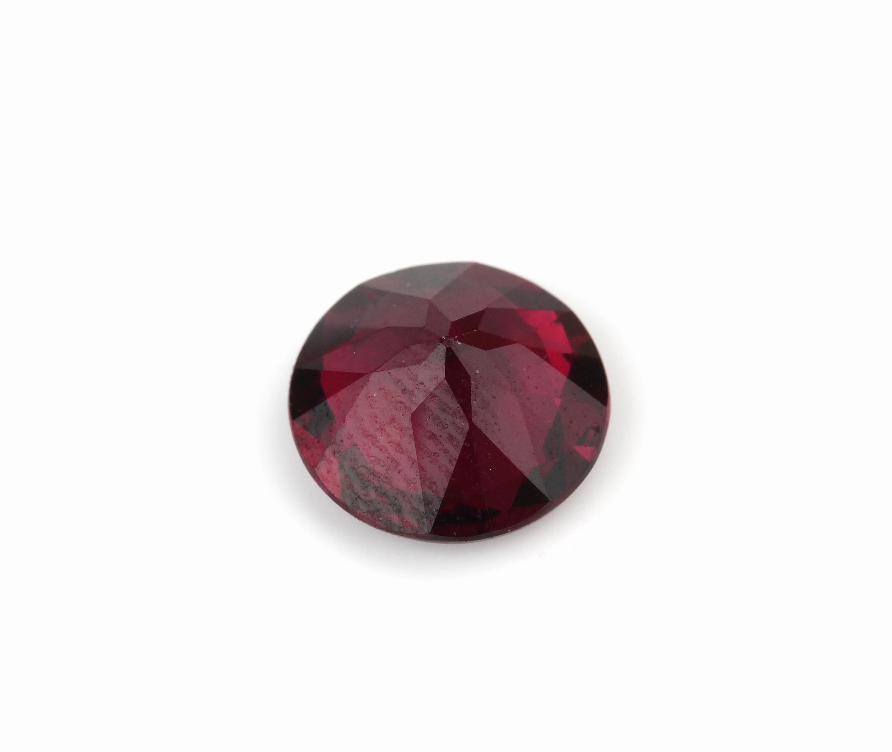 Detail b: Lot lose Granate zus. ca. 61.8 ct, 12 x ovalfacett., 1 x rundfacett., 3 x EmeraldCut, 4 x Rechteck, 1 x Carree