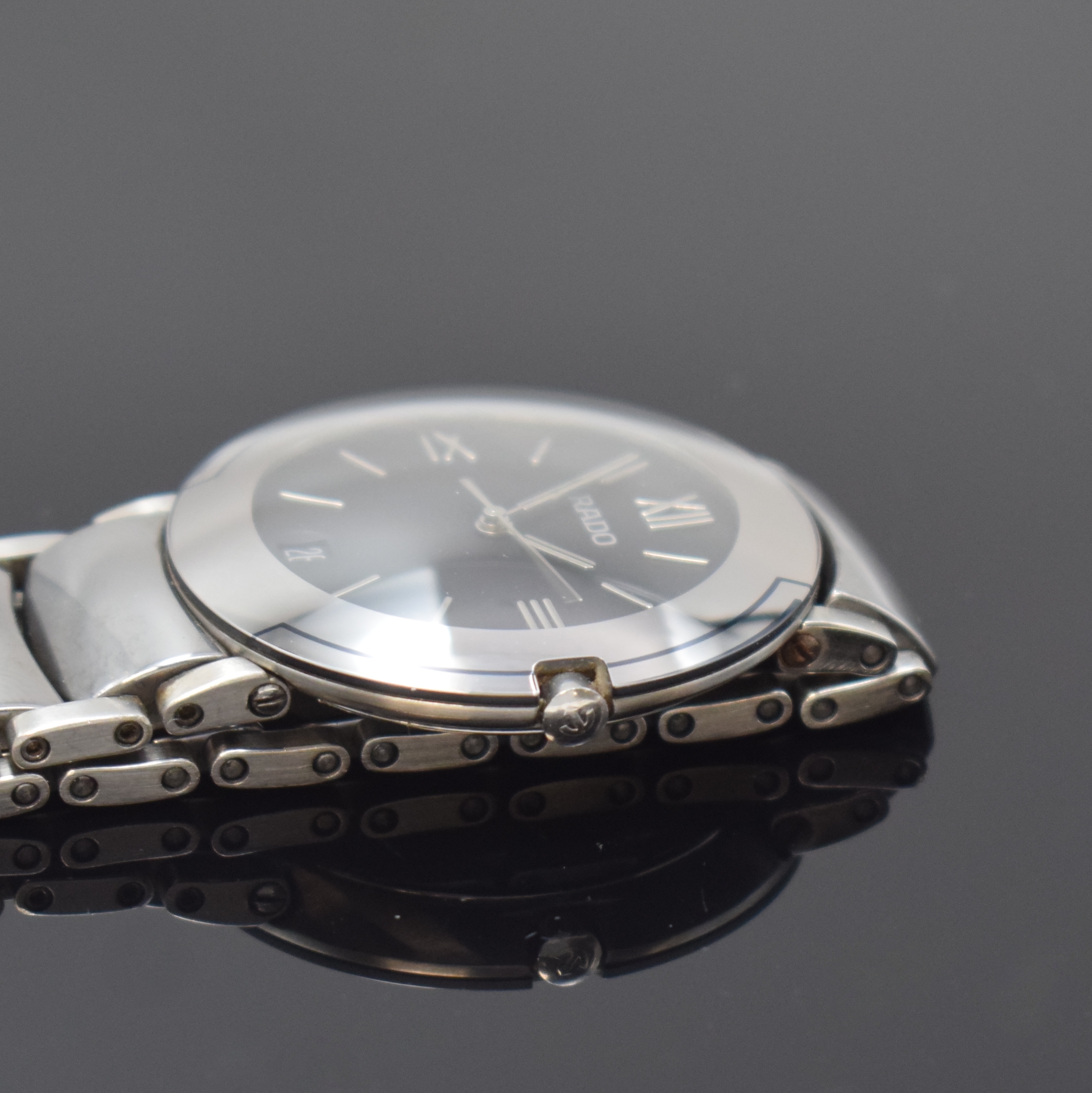 Detail c: RADO Diastar Herrenarmbanduhr in Stahl Referenz 115.0624.3, Schweiz um 2010, quarz, Boden aufgedr., orig. Gliederband in High- Tech Keramik m. dopp. ...