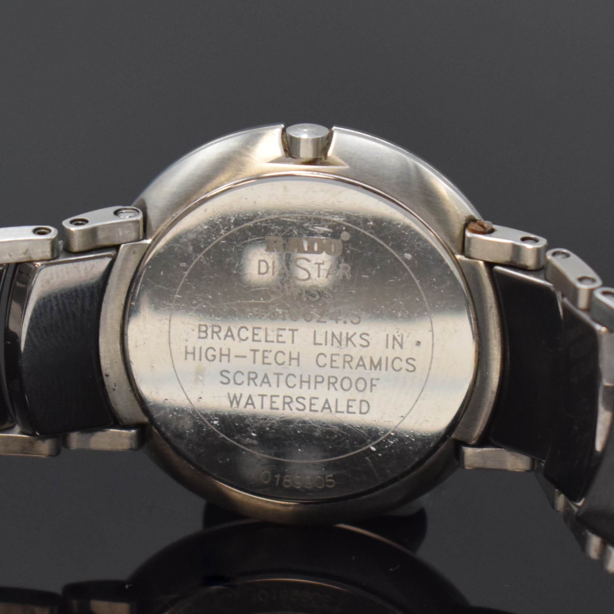 Detail d: RADO Diastar Herrenarmbanduhr in Stahl Referenz 115.0624.3, Schweiz um 2010, quarz, Boden aufgedr., orig. Gliederband in High- Tech Keramik m. dopp. ...