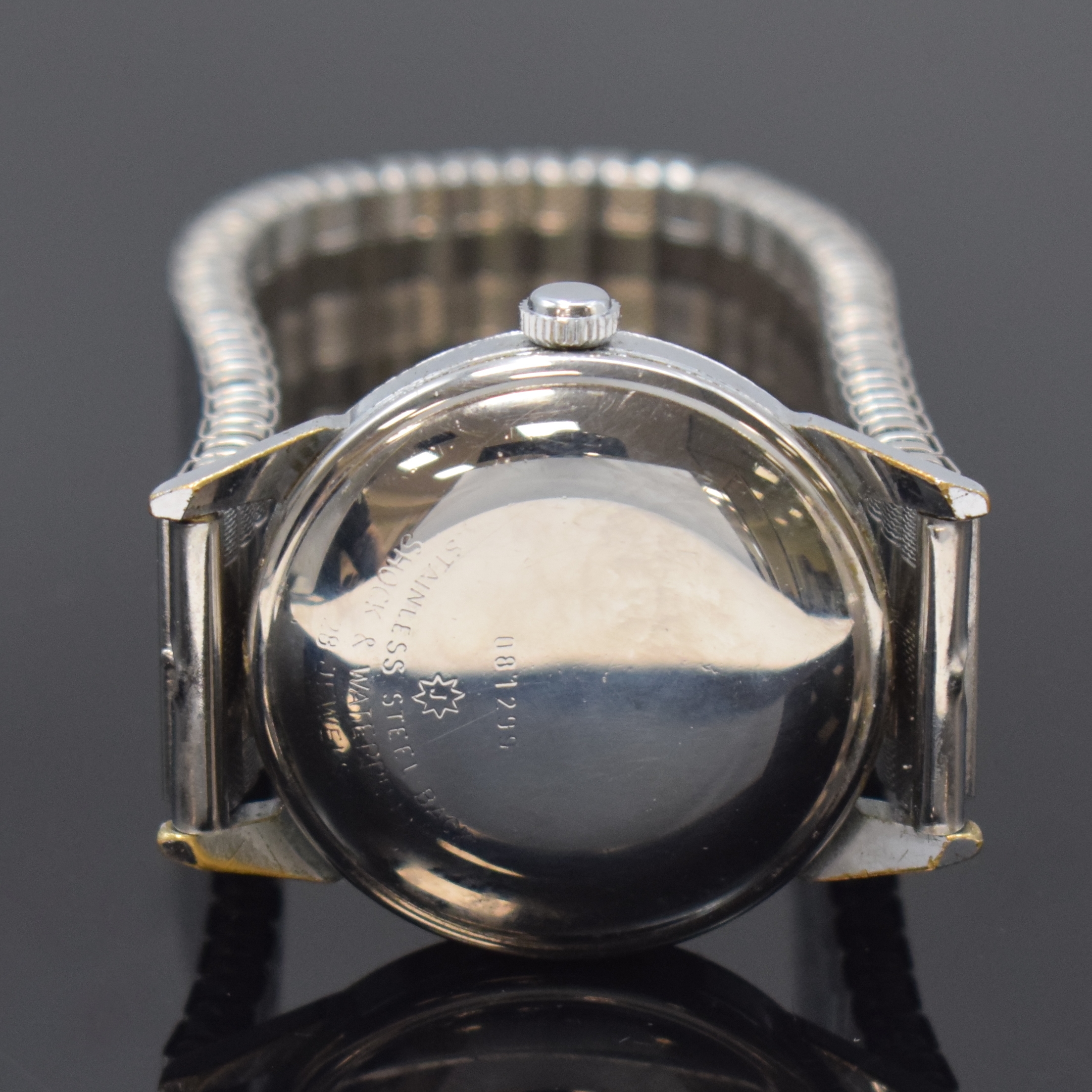 Detail c: JUNGHANS Chronometer Kaliber 83 verchromte Herrenarmbanduhr, Deutschland um 1960, Automatik, Geh. m. aufgedr. Stahlboden, Flexband, silb. Zifferbl. ...