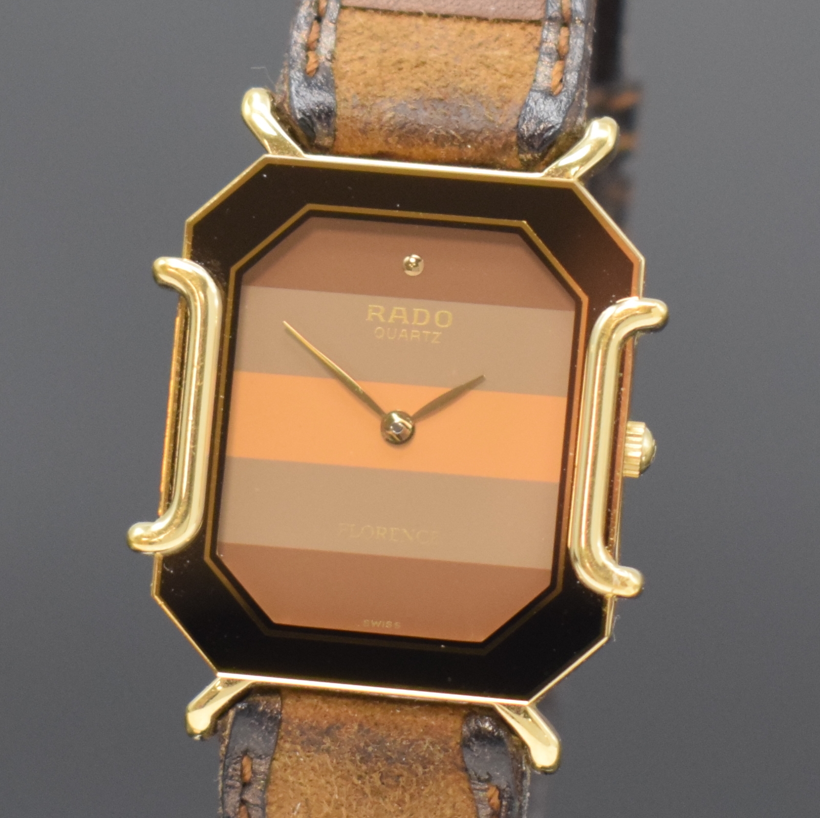 Detail a: RADO Florence Armbanduhr Referenz 150.3408.2, Schweiz um 1995, quarz, Stahl/vergoldet, Boden 4-fach verschr., orig. Lederband m. Dornschl., mehrfarb. ...