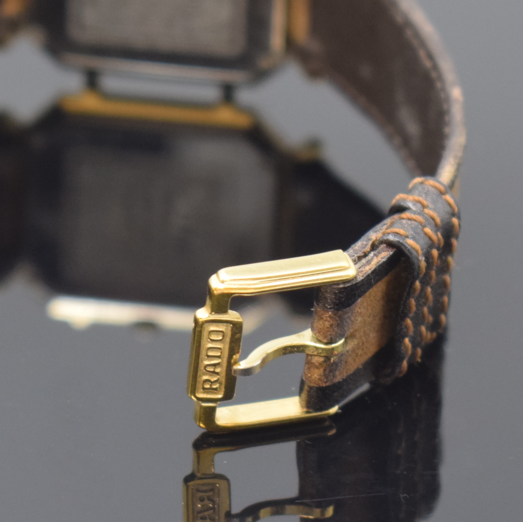 Detail b: RADO Florence Armbanduhr Referenz 150.3408.2, Schweiz um 1995, quarz, Stahl/vergoldet, Boden 4-fach verschr., orig. Lederband m. Dornschl., mehrfarb. ...