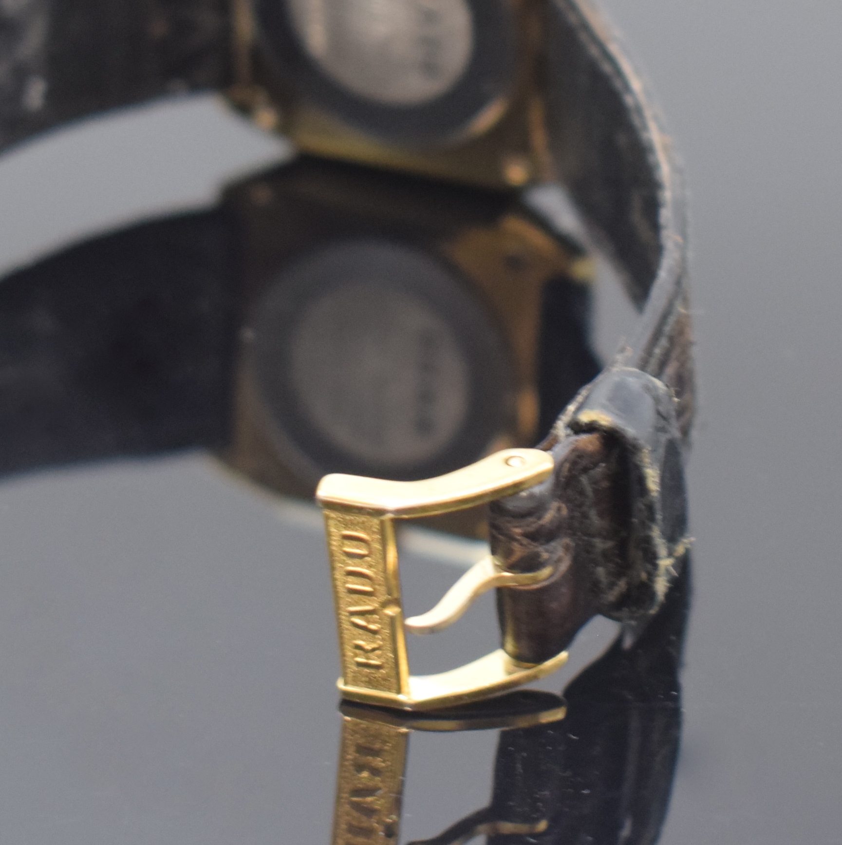 Detail b: RADO Florence Armbanduhr in Stahl/Gold Referenz 129.3327.2, Schweiz um 1995, quarz, Boden aufgedr., orig. Lederband m. Dornschl., Saphirglas, braunes ...