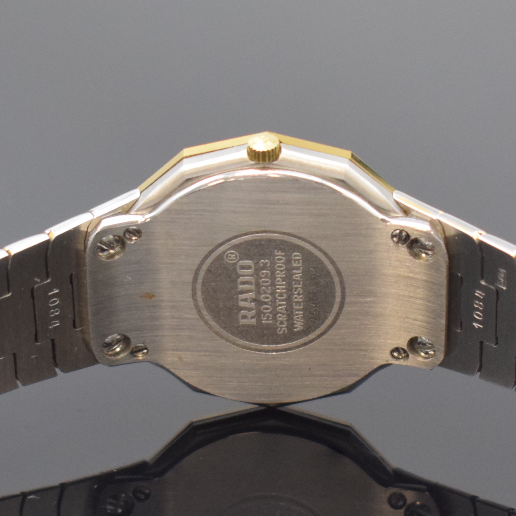 Detail d: RADO Diastar Armbanduhr in Stahl/Gold Referenz 150.0209.3, Schweiz um 1995, quarz, orig. Gliederband m. dopp. Faltschl., Boden 4-fach verschr., silb. ...