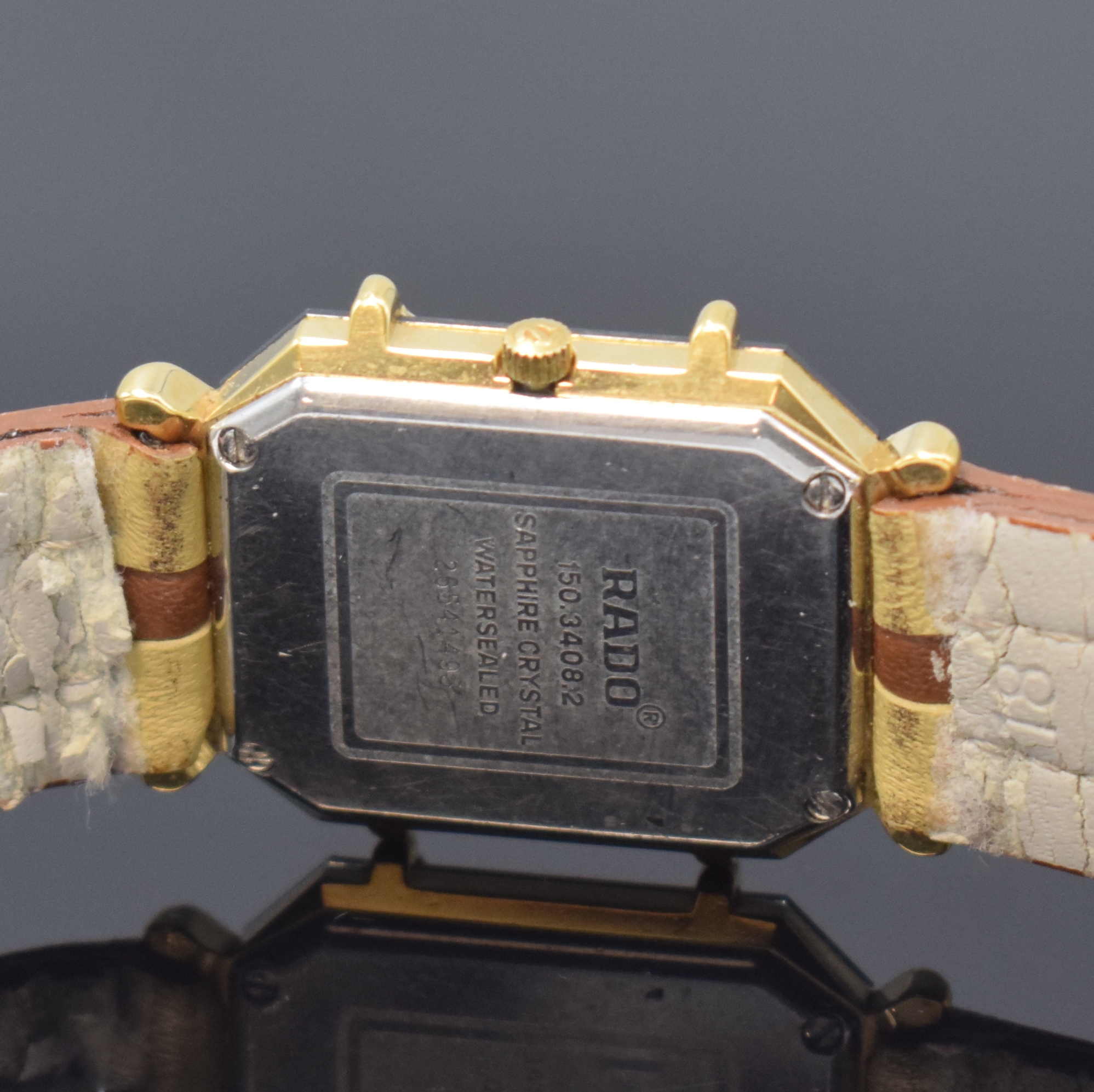 Detail c: RADO Florence Armbanduhr Referenz 150.3408.2, Schweiz um 1995, quarz, Stahl/vergoldet, Boden 4-fach verschr., mehrfarb. Zifferbl. m. gold. Zeigern, ...