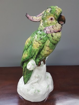 26781196f - Very large parrot, designed by M. Hartung, 20th century, porcelain, number. 3861, polychrome painted, height approx. 41 cm