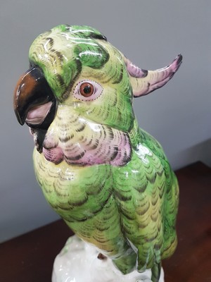 26781196j - Very large parrot, designed by M. Hartung, 20th century, porcelain, number. 3861, polychrome painted, height approx. 41 cm